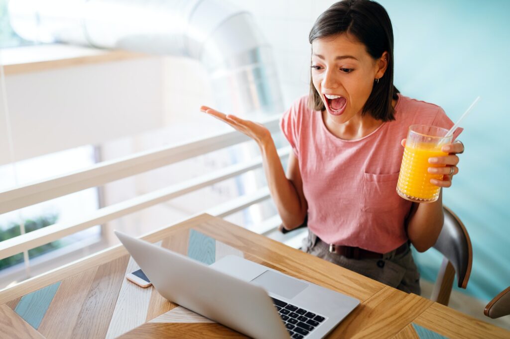 confused-shocked-beautiful-young-woman-looking-at-tablet-computer